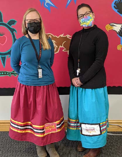Two people in tribal clothing
